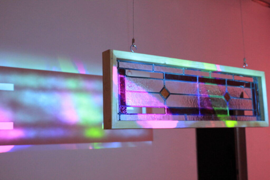 Artwork by Izzy Cheyne Jones in an exhibition space